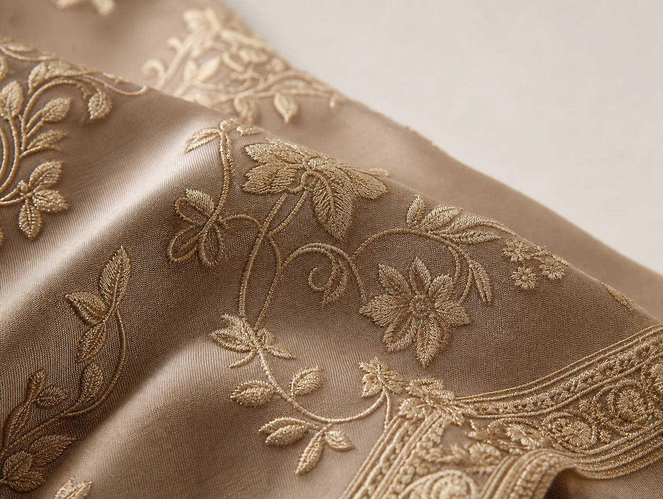 Intricate metallic gold and deep charcoal luxury damask jacquard weave