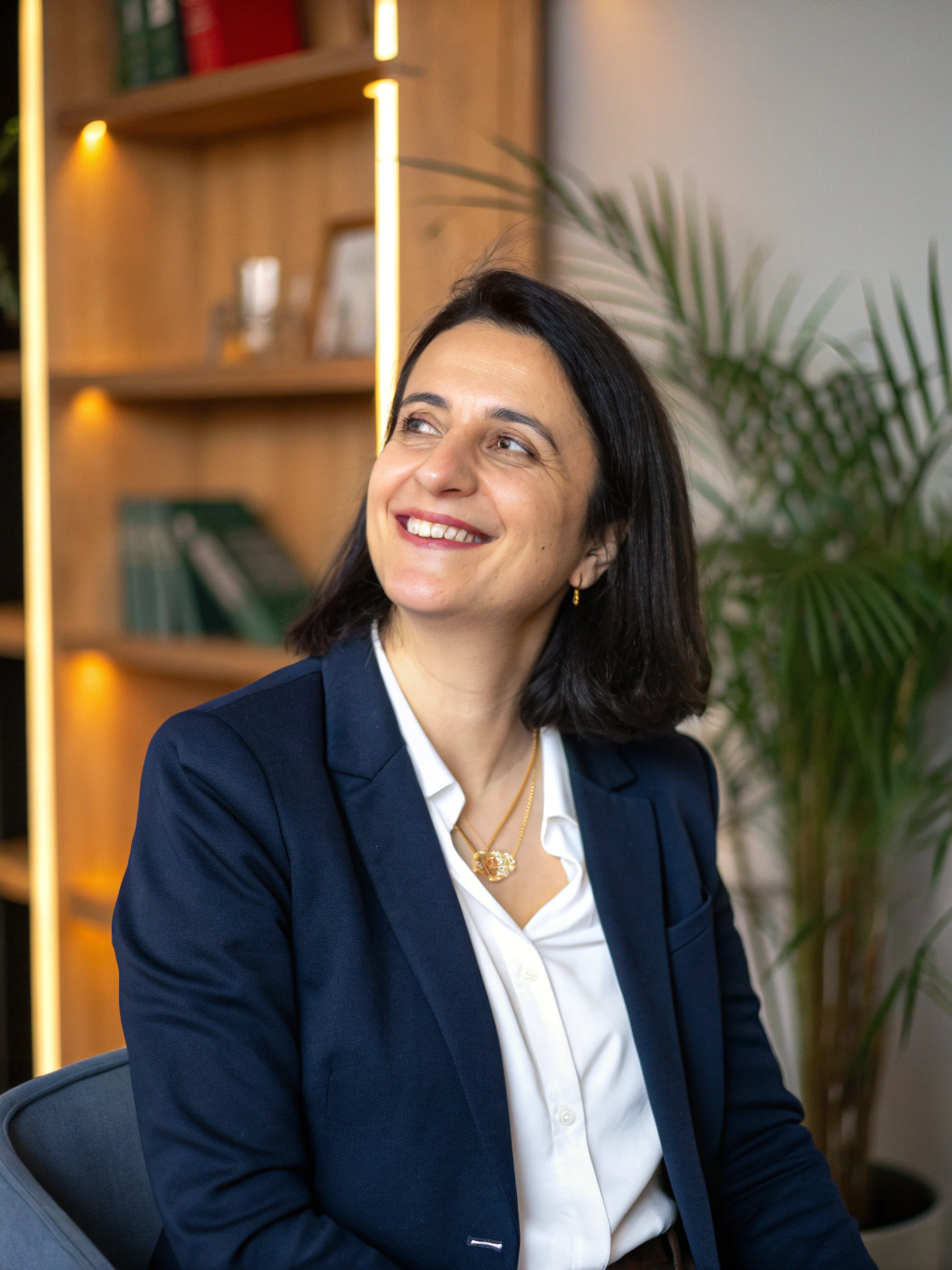 Studio portrait of Claire Dupont, Client Relations Director